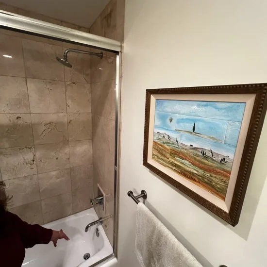 Bathroom showing water damage requiring professional restoration and mold remediation services