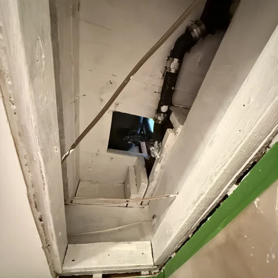 Ceiling area prepared for mold remediation with all contaminated materials identified for removal